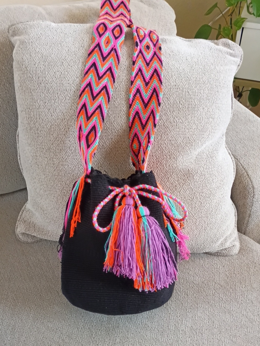 Handwoven Black Bucket Bag with Multicolor Strap and Tassels